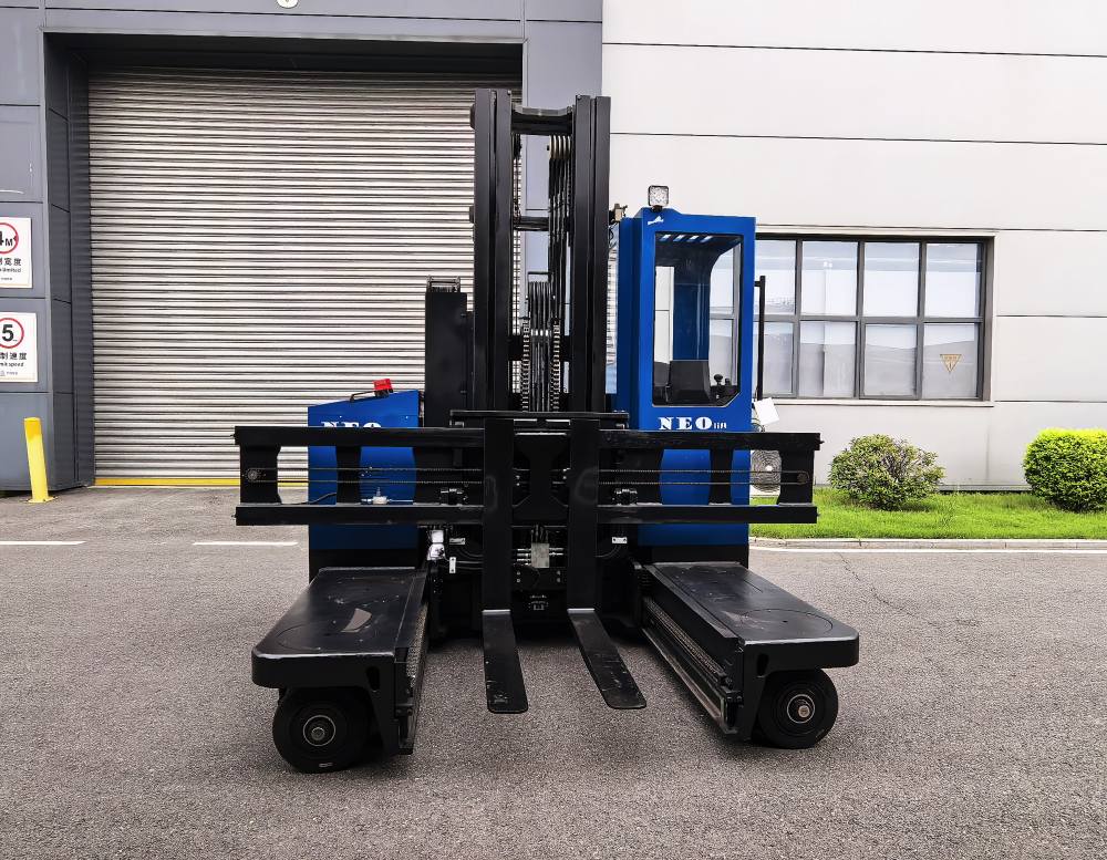 NEO FORKLIFT electric warehouse forklift in front of plant